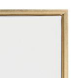 Close-up of a framed blank white canvas with a light natural wood frame and visible canvas texture