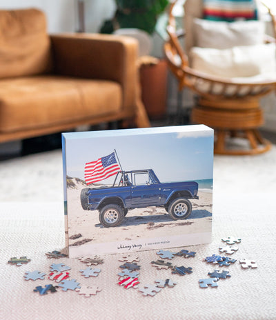 American Bronco 500 Piece Puzzle showing vintage Bronco vehicle on a beach with vivid colors