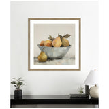 Framed painting of a light gray bowl filled with yellow pears and a single pear resting outside it, displayed on a white wall above a black shelf with plants and books.