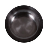 Top view of a smooth, round ribbed metal bowl with a dark, reflective finish and subtle concentric ridges along its rim