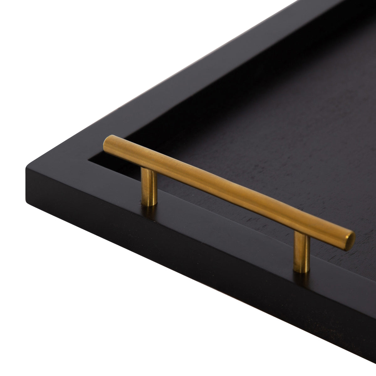 Black rectangular tray corner with a sleek gold horizontal handle attached to the raised edge, showing smooth, matte surface and minimalist design.