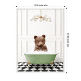 A young brown bear cub sits in a bubble-filled light green clawfoot bathtub on a black and white checkerboard floor beneath a modern gold chandelier with glass orbs.