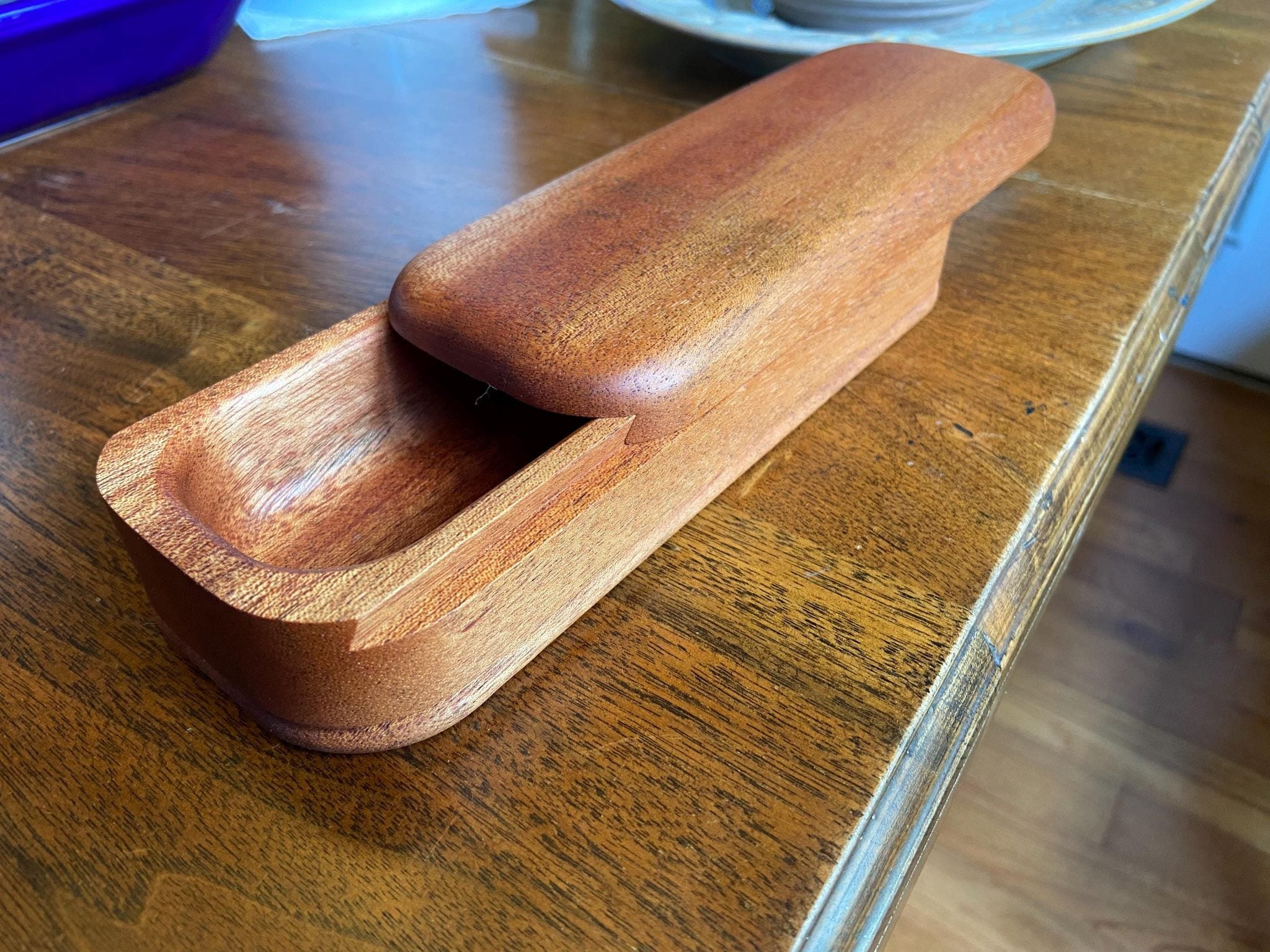Handcrafted mahogany keepsake box with sliding dovetail joinery and beaded bottom detail