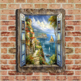 Painting of a coastal cliffside village viewed through open blue shutters, featuring stone pathways, colorful houses, and sailboats on vibrant blue water under a cloudy sky.