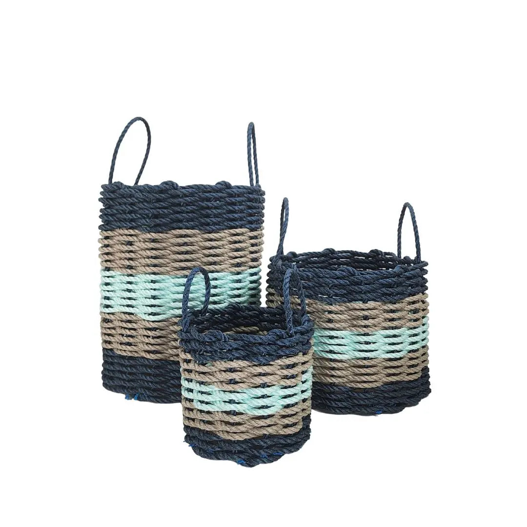 Five Stripe Rope Storage Basket in navy, tan, and seafoam colors, shown in multiple sizes