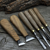 6-piece wood carving tool set including knives, gouges, and chisels with wooden handles