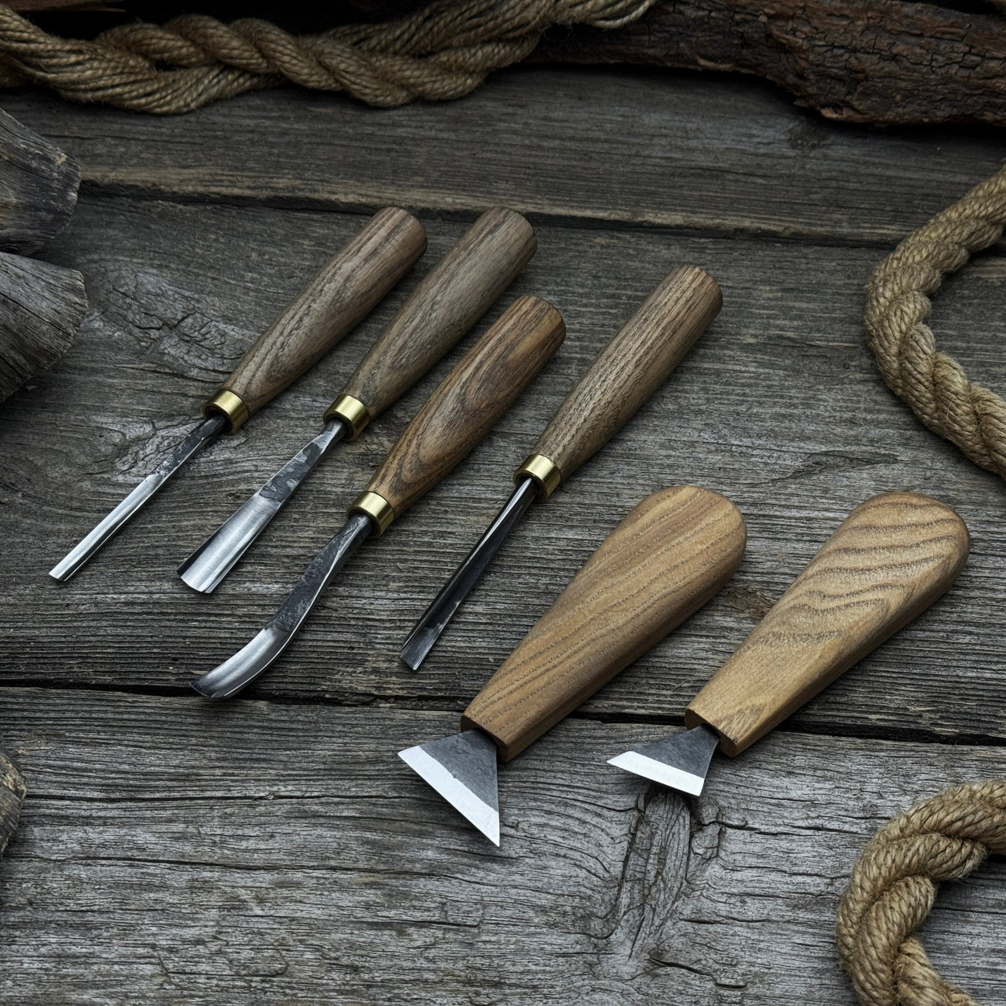 6-piece wood carving tool set including knives, gouges, and chisels with wooden handles
