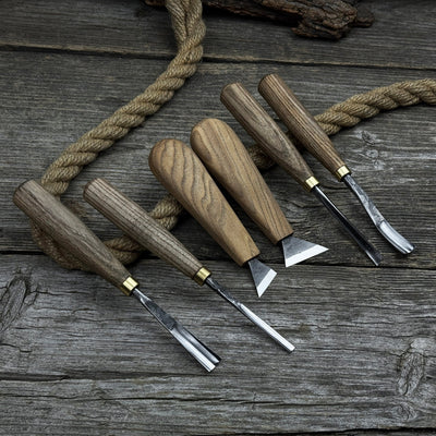 6-piece wood carving tool set including knives, gouges, and chisels with wooden handles