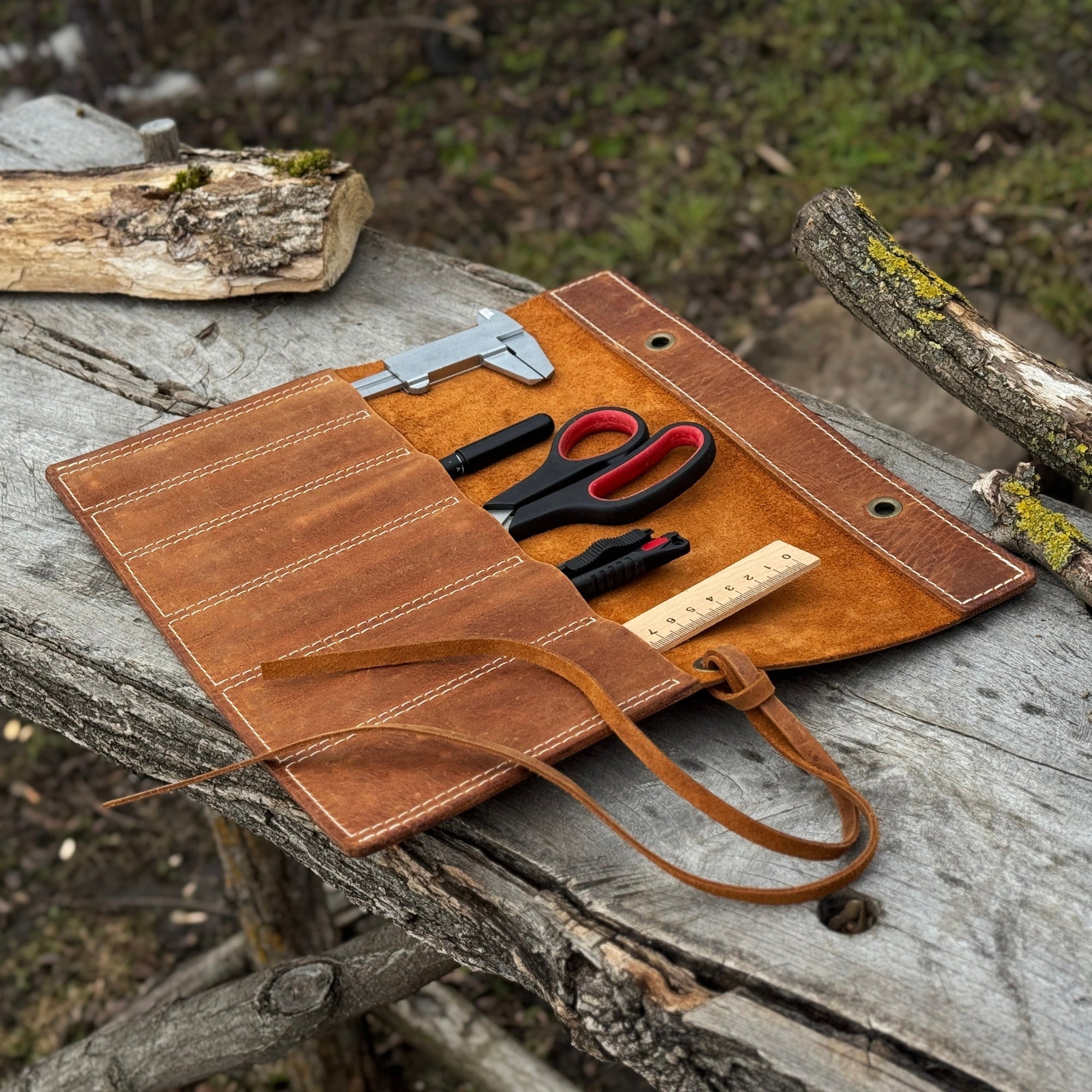 Handmade 6 Pocket Leather Chisel Roll made from genuine Crazy Horse leather, holding carving tools
