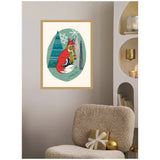 Framed print of a red fox wearing a striped scarf, sitting in front of stylized teal and green pine trees, with snowflakes and the word "peace" on a beige wall.