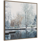 Sylvie framed canvas depicting snow-covered punts on the River Cam with bare trees and reflective water