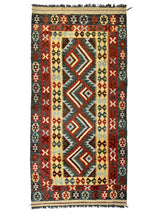 Afghani Maimana Kilim Wide Runner Rug with geometric patterns in neutral and warm tones on a floor
