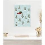 Illustrated Christmas scene with snow-covered evergreen trees on a pale blue background, featuring a red vintage car carrying a pine tree on its roof.