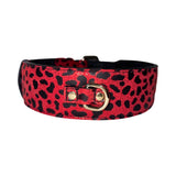 Red Italian leather collar with black leopard print pattern and a gold metal buckle, shown in a curved position against white background.