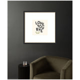 Framed minimalist wall art with black text 'LOVE YOU BYE SEE YOU SOON' in staggered lines on white background, hanging above olive green velvet chair and black side table with glass.