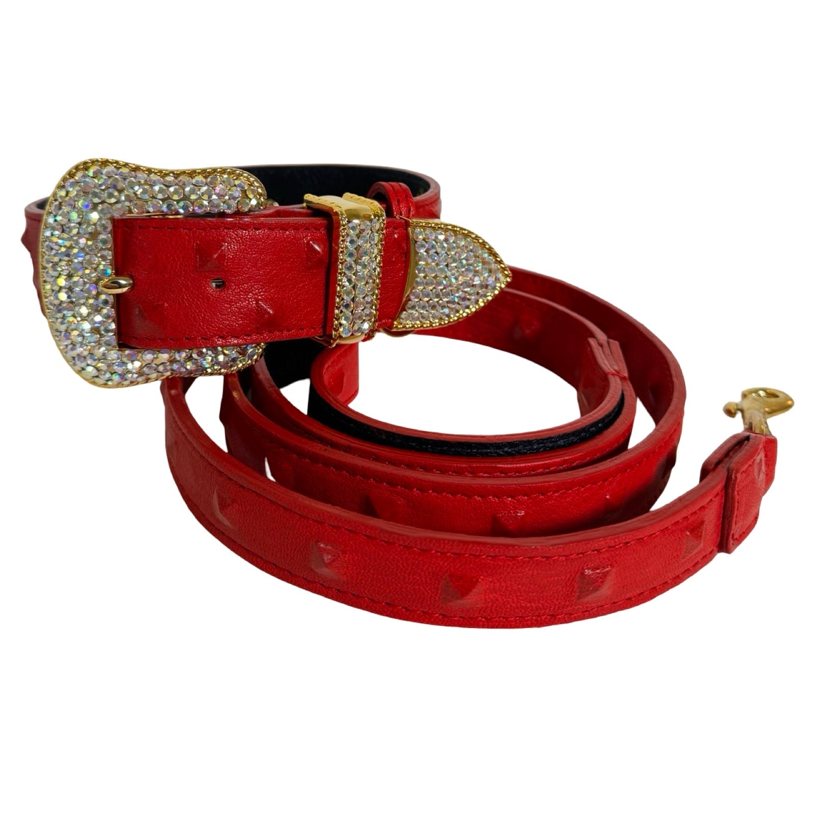 Bella Rosso Swarovski Crystal Collar & Leash Set lying on a soft surface highlighting red embossed leather and sparkling gold crystal hardware