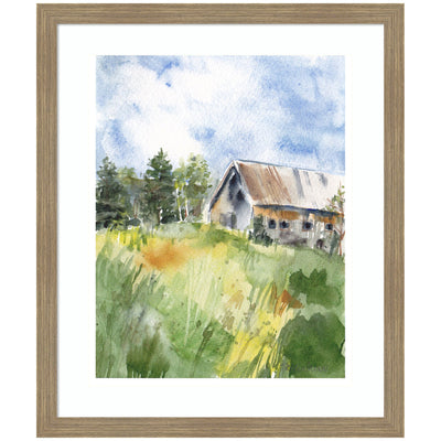 Framed art print of a rustic barn in summer landscape with lush greenery and blue sky