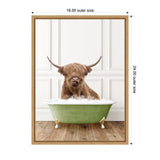 Brown Highland cow with long shaggy hair and large curved horns sitting in a green clawfoot bathtub filled with bubbles against a white paneled wall and wood floor.