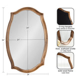 Wall mirror with a thick scalloped solid wood frame in a rustic finish, measuring 34 by 24 inches with 1.5-inch depth and D-ring hangers for vertical or horizontal mounting.