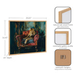 Painting of a lion reclining on a red velvet armchair with dark, moody green and gold background tones, framed in natural light oak wood.