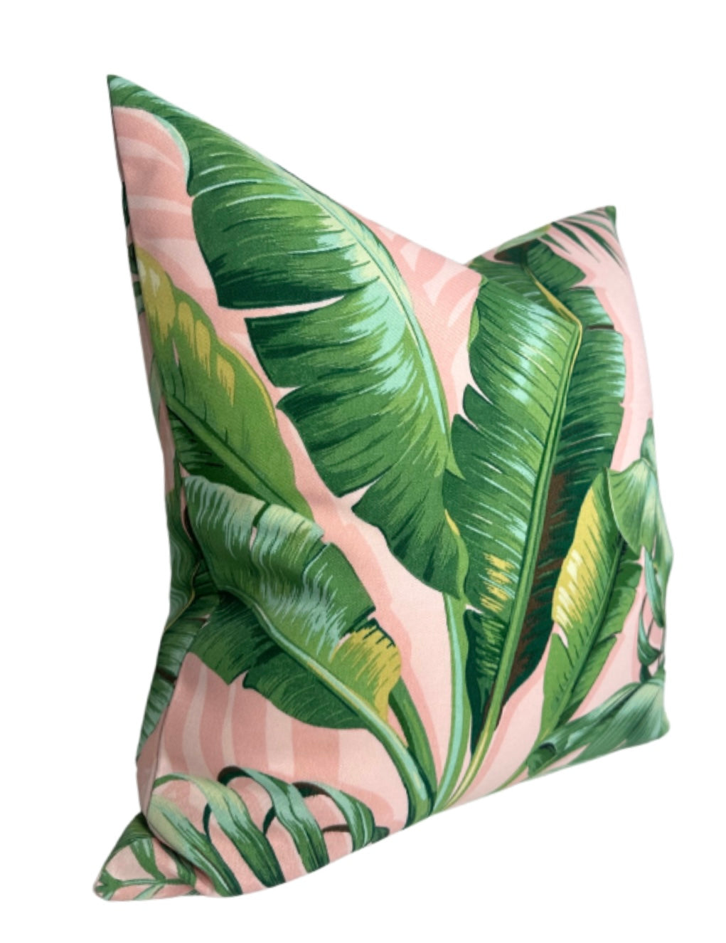 Square pillow cover with large green palm leaves on a light pink background, showcasing detailed leaf veins and natural gradients in green shades.