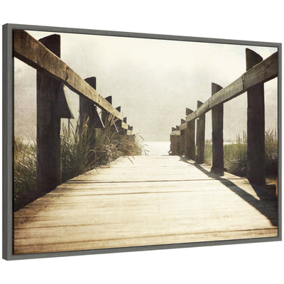 Framed canvas art depicting a wood walkway leading through coastal woods at Cannon Beach