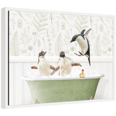 Framed floating canvas art titled 'Sylvie Penguins in Fern Bath' showing penguins amongst ferns.