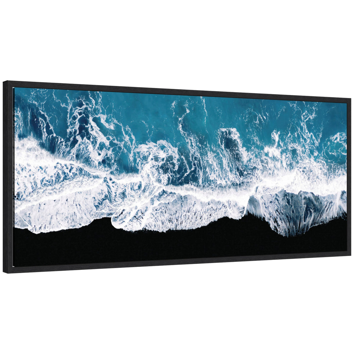 Aerial view of turquoise ocean waves crashing onto a black sand beach, captured in a wide rectangular framed canvas print by Michael Schauer.