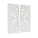 Two white carved wood panels featuring symmetrical floral and swirl patterns forming a circular design, displayed side by side with a slight gap.