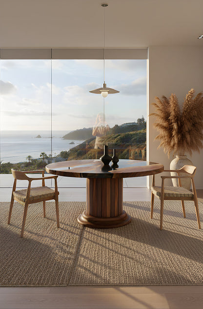 Handcrafted round dining table with walnut wood top and solid wood drum pedestal base featuring custom epoxy resin inlay