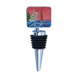 Close-up of the Muskegon Lighthouse wine bottle stopper showing the decorative zinc-alloy top and stainless steel base
