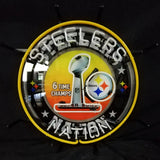Circular neon sign with yellow border featuring a silver Vince Lombardi Trophy, a black and white Steelers logo, and text reading "Steelers Nation" and "6 Time Champs"