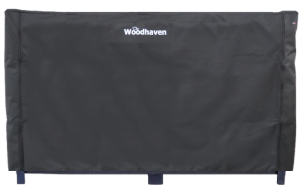 Woodhaven Full Firewood Rack Cover with zipper closure protecting stacked firewood outdoors