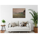 Muted landscape painting with soft purples, greens, and yellows depicting a misty shoreline and moonlit sky, framed above a white sofa in a modern living room.