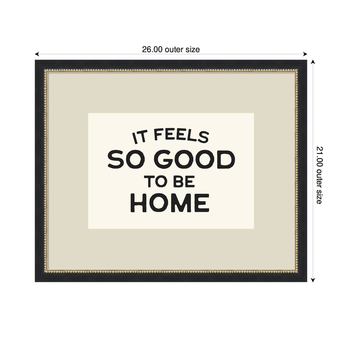 Framed wall art with black bold typography reading 'It feels so good to be home' centered on a light beige background with a dark, ornate border and gold beaded inner trim.