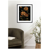 Framed painting of orange poppy flowers with green leaves on a black background, hung above an olive green armchair with an open book, next to a potted plant in a woven basket.