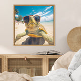 Close-up of a green sea turtle wearing oversized brown sunglasses on a sunny beach with blue sky and ocean in the background.