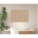 Rectangular beige pinboard with a subtle white lattice pattern, framed in light wood, hanging on a pale wall above a wooden desk with books and a white chair nearby.