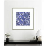 Square framed artwork featuring intricate blue floral patterns with various shades of blue and detailed leaf designs on a light background, centered on a white wall.