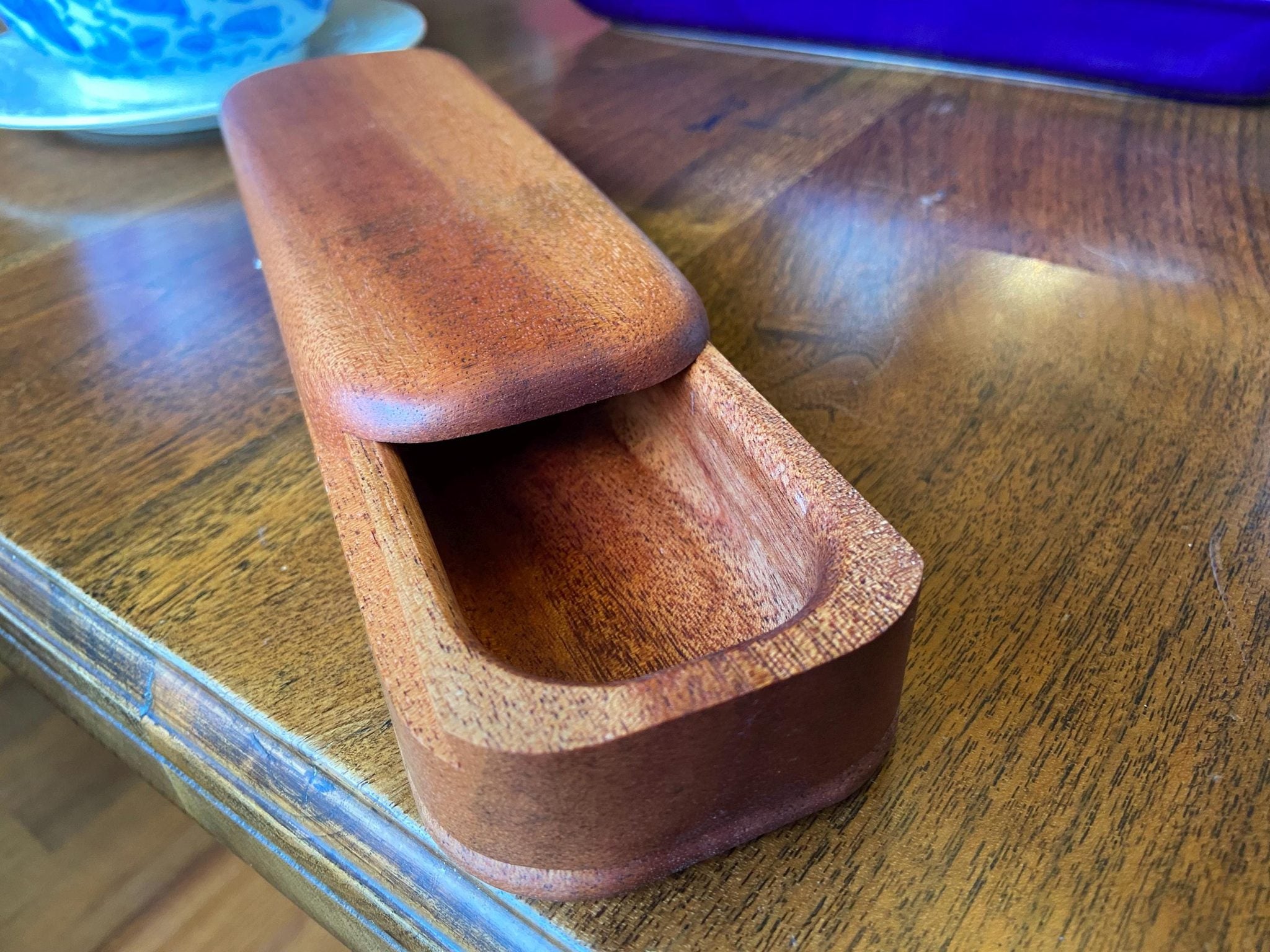 Handcrafted mahogany keepsake box with sliding dovetail joinery and beaded bottom detail