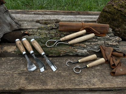 7-piece hand-forged wood carving tool set with ash wood handles and leather cases