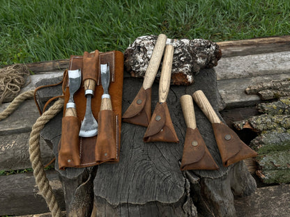 7-piece hand-forged wood carving tool set with ash wood handles and leather cases