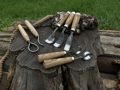 7-piece hand-forged wood carving tool set with ash wood handles and leather cases
