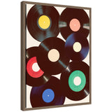 Sylvie Retro Vinyl framed canvas art showing vibrant retro vinyl record theme, displayed against a neutral wall.
