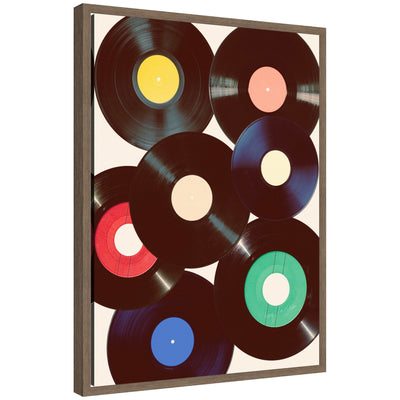 Sylvie Retro Vinyl framed canvas art showing vibrant retro vinyl record theme, displayed against a neutral wall.