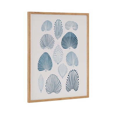 Framed abstract coastal blue coral print hung on a light-colored wall