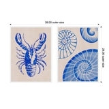 Two framed canvas art pieces side by side; left shows a detailed blue lobster on a beige background, right features three stylized blue seashells on beige.