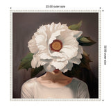 Portrait of a woman in a white shirt with her face obscured by a large white flower with a brown center and green leaves, set against a dark brown background framed in white.