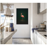 Framed canvas wall art of a pink flamingo on a rich green background hung on a white kitchen wall between gray concrete countertops and modern cabinets.