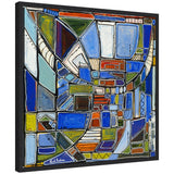 Abstract geometric painting with intersecting shapes in blue, orange, green, and white tones framed in black, signed by Leah Nadeau in the corner.
